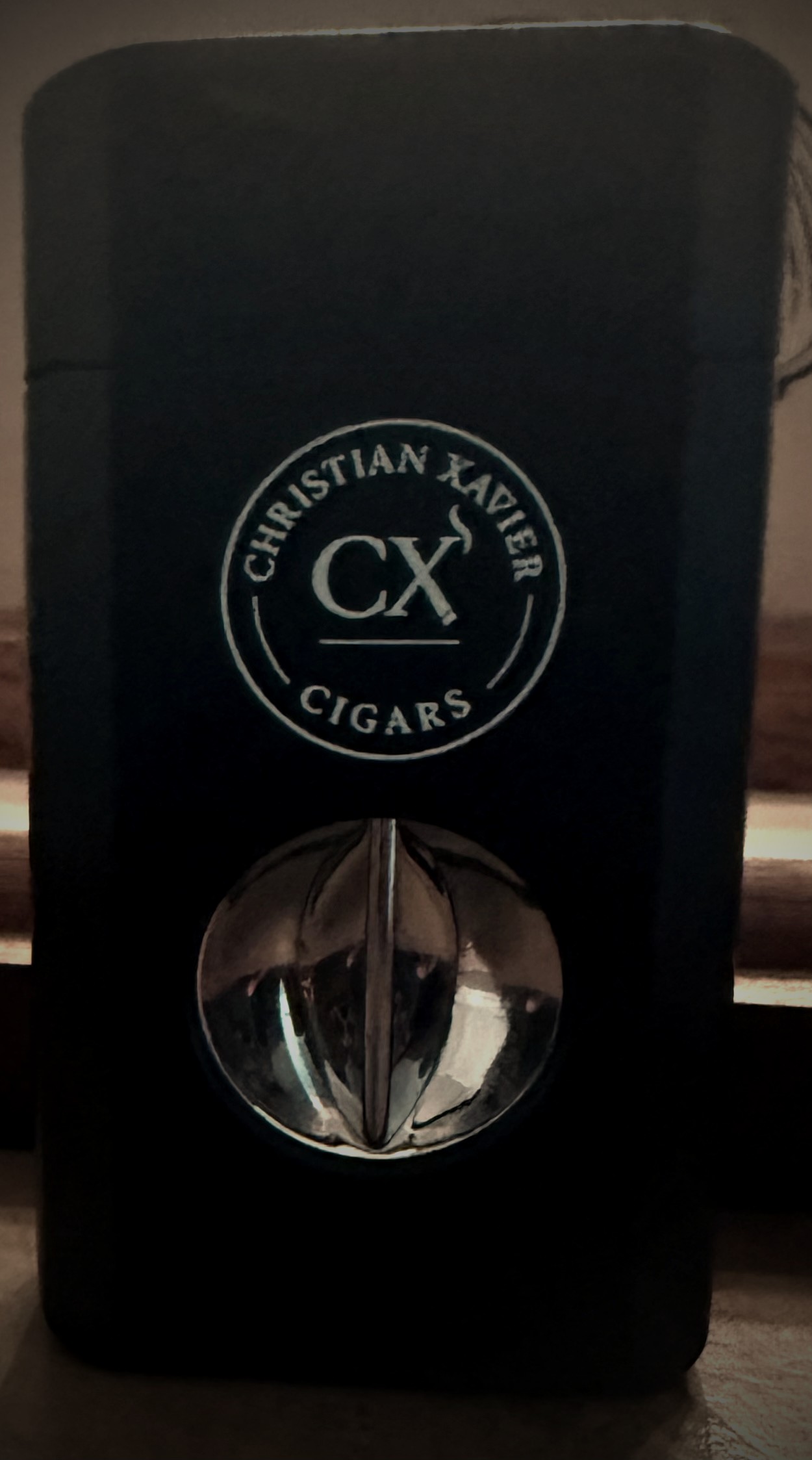 CX Signature Lighter — premium torch lighter with Christian Xavier emblem